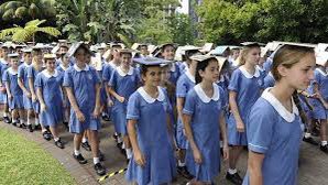 image from The record for most people balancing books on their heads at the same place and time is 998 in North Sydney, Australia, in 2012.