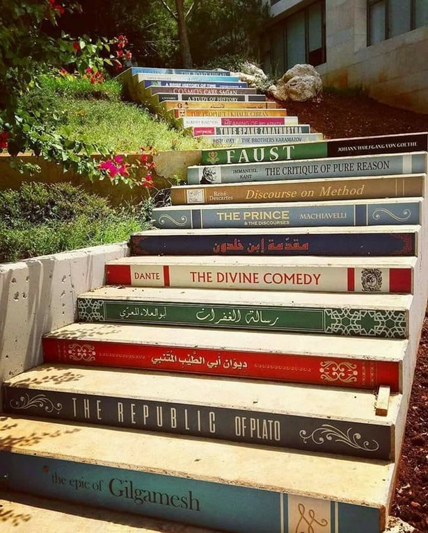 image from “The Stairs of Knowledge” is a staircase near the library at University of Balamand in Lebanon. The 21 stairs were painted after 21 classical books in chronological order.